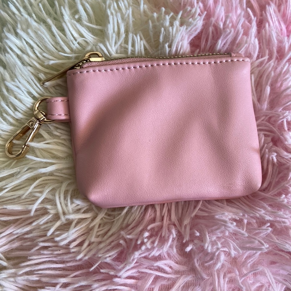 Baby pink wallet with clip. Used twice.